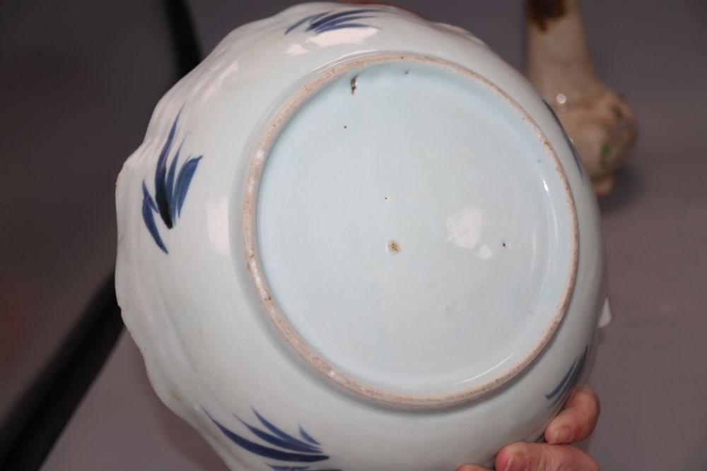 An 18th century Japanese blue and white dish, a studio vase and a Kutani plate and tea bowl and saucer, tallest 20cm